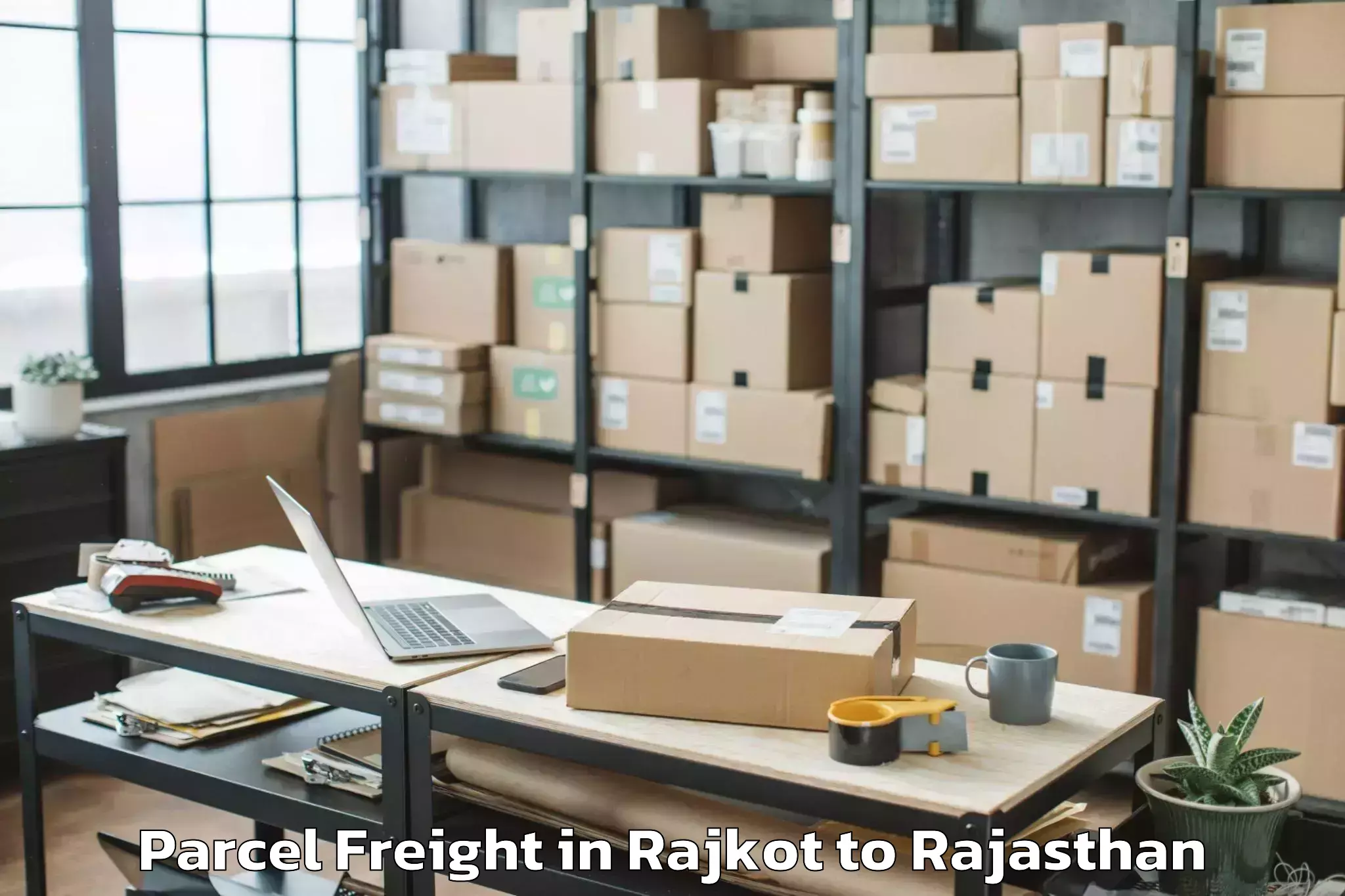 Book Rajkot to Hindaun Parcel Freight